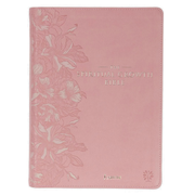 Pink book with floral design and 'The Spiritual Growth Bible' text on a white background