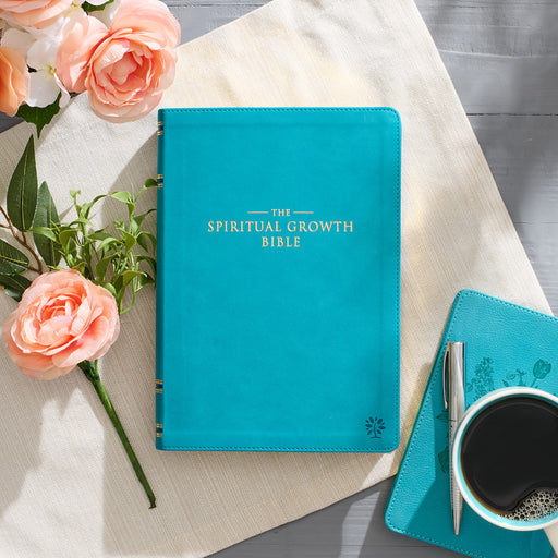 Teal book titled 'The Spiritual Growth Bible' on a white background