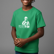 Child wearing a green t-shirt with a St. Joseph graphic and text on a gray background