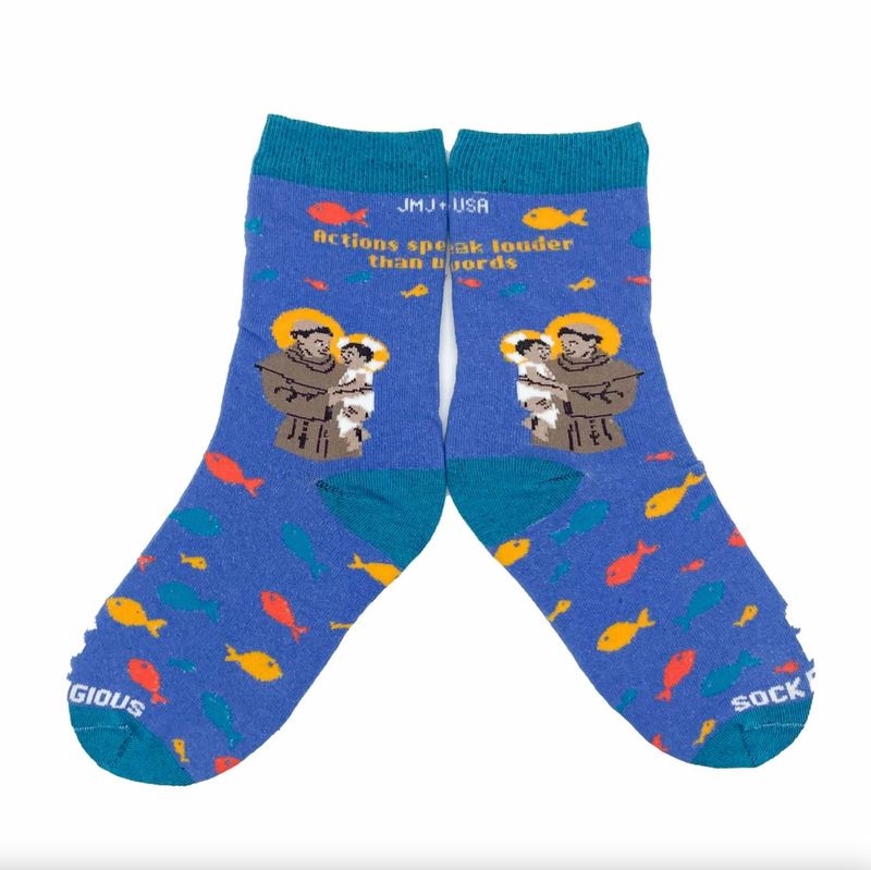 A pair of kids' socks with colorful designs and an image of St. Anthony of Padua holding the Christ Child
