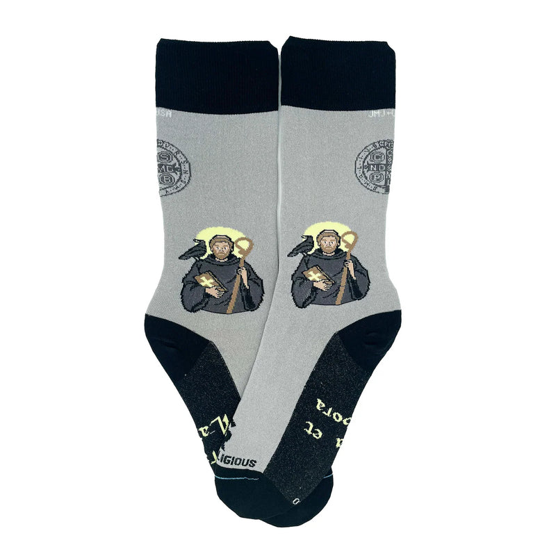 Gray socks with St. Benedict design on a white background