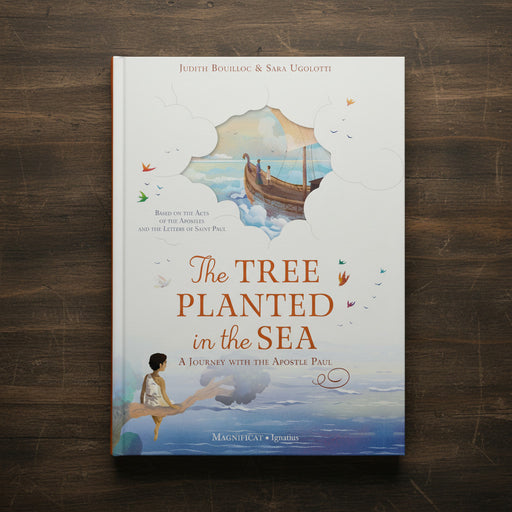 Book cover of 'The Tree Planted in the Sea' on a wooden surface
