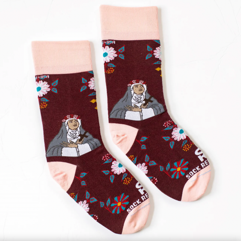 Burgundy and pink floral crew socks with an imagine of St. Rose of Lima.