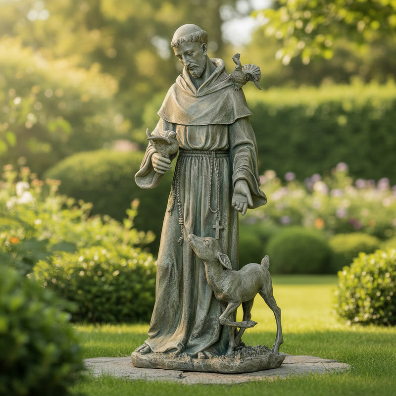 Statue of a religious figure with a bird and a deer in a garden setting