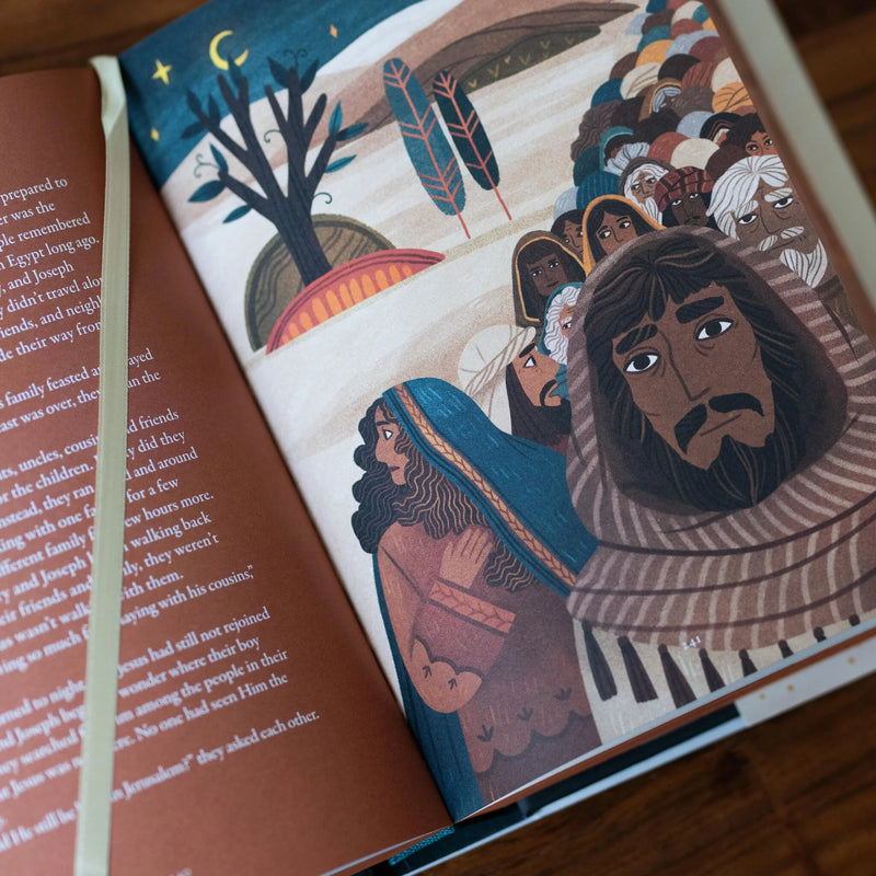 Illustrated book open to a page with characters and text