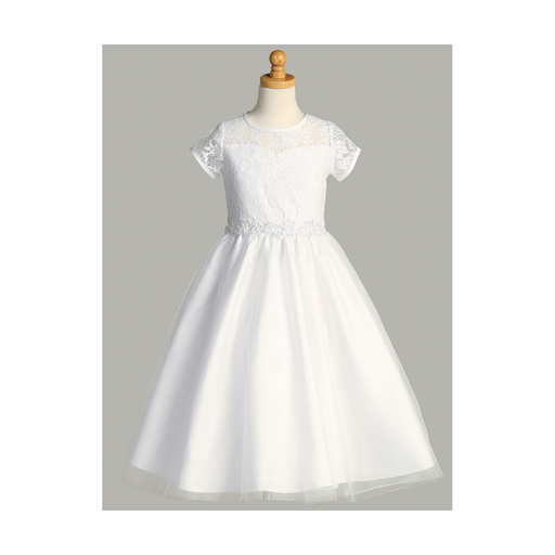 A white lace First Communion dress with a sweetheart neckline on a gray background