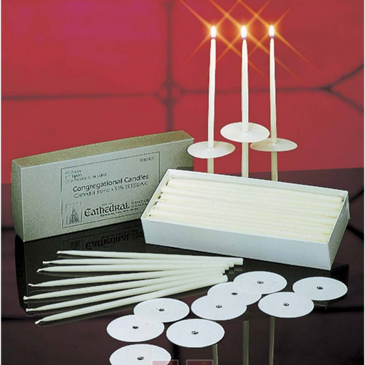 Cathedral candles with packaging on a reflective surface against a red background