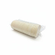 Roll of white Communion wafers in clear packaging on a white background