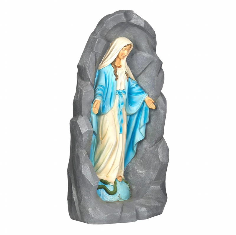 Statue of the Virgin Mary in a rocky background on a white background