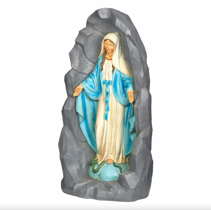 Statue of Mary in a rocky setting on a white background