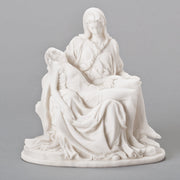 White sculpture of the Pieta on a gray background
