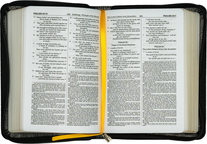 Open Bible with a black cover and yellow bookmark