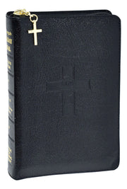 Black leather-bound missal with gold cross on a black background
