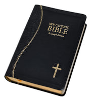 Black and gold Bible on a white background.