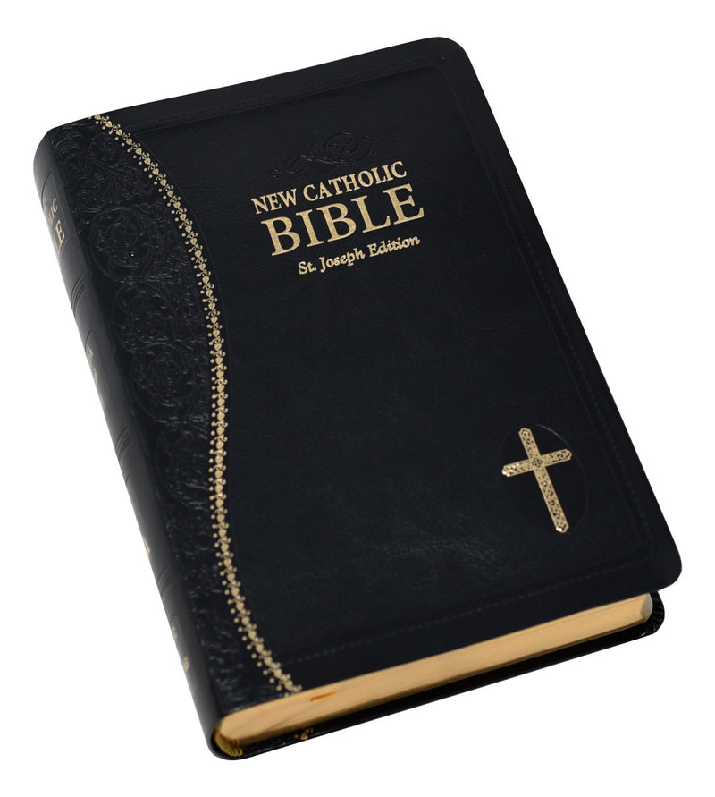 Black and gold Bible on a white background.