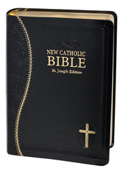 Black and gold Bible on a white background.