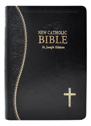 Black and gold Bible on a white background.