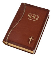 Brown and gold Bible on a white background.