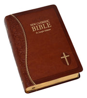 Brown and gold Bible on a white background.
