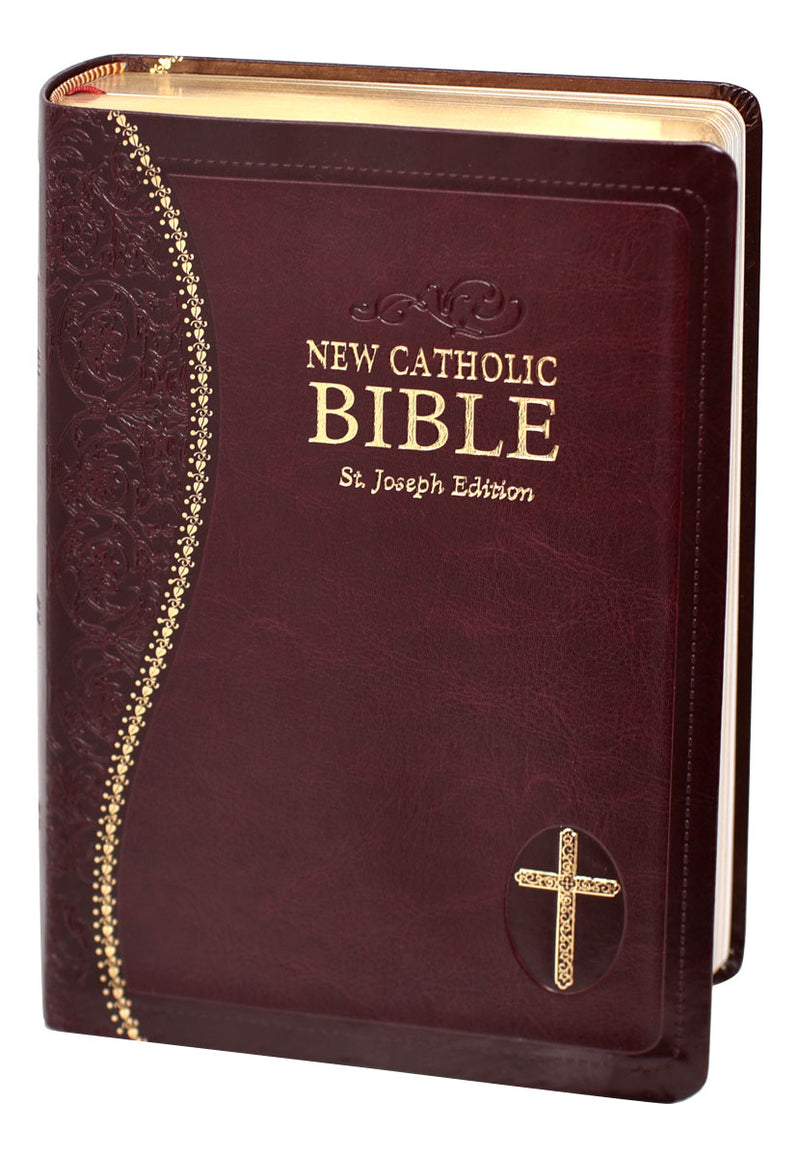 Burgundy and gold Bible on a white background.
