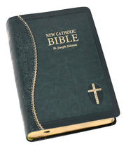 Green and gold Bible on a white background.