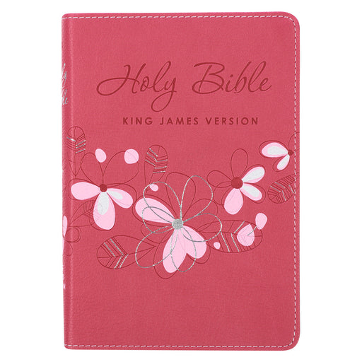 A pink faux leather compact Bible with a floral design and the text 'Holy Bible King James Version' on the cover. The Bible is presented in a flexible cover format with a satin ribbon marker.
