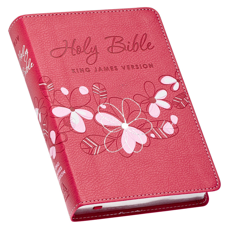 Pink Bible with floral designs and 'Holy Bible King James Version' text on a white background