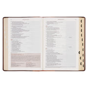 A two-tone espresso and toffee brown faux leather Bible on a white background.