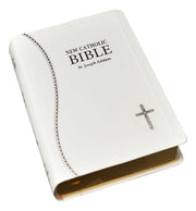 White and gold Bible on a white background.