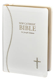 White and gold Bible on a white background.