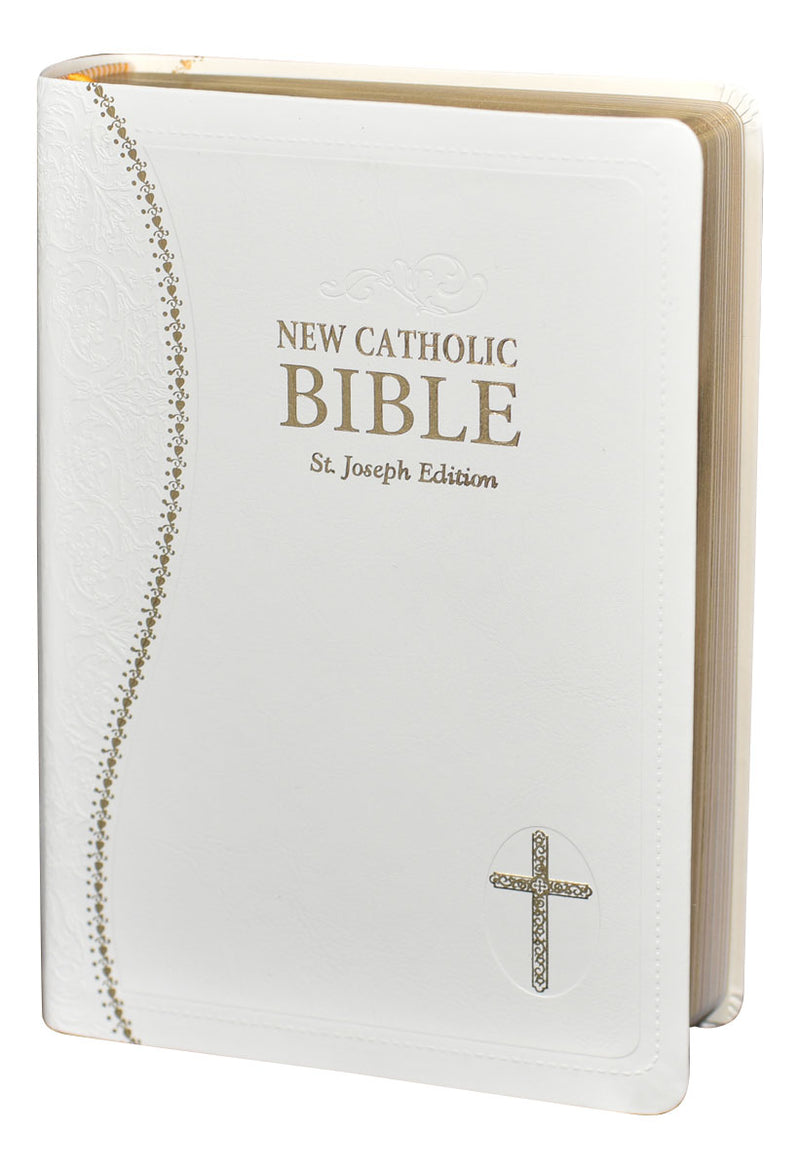 White and gold Bible on a white background.