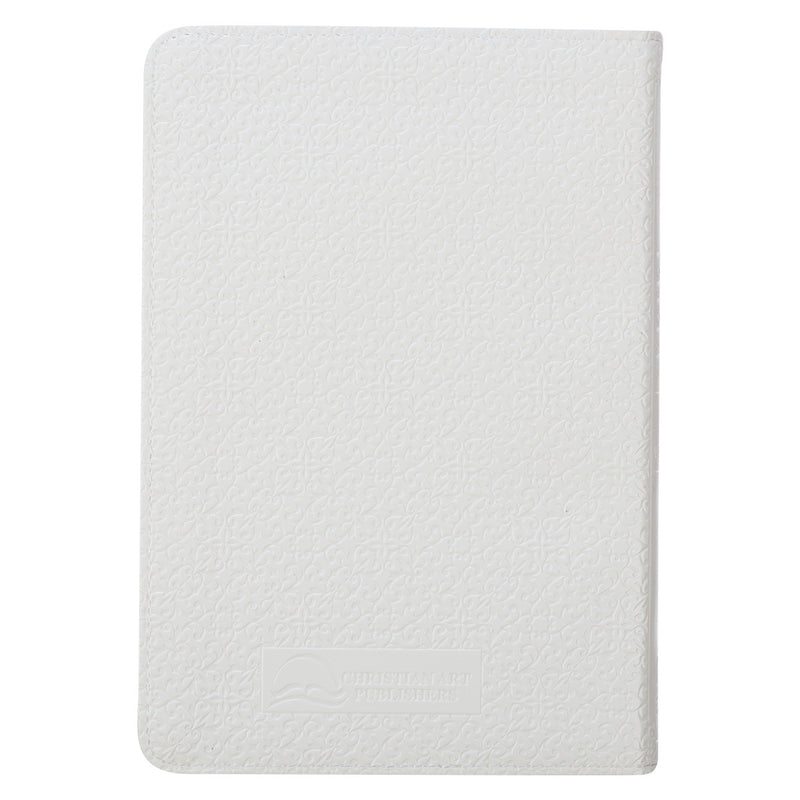 A white faux leather compact Bible with a quatrefoil floral design.