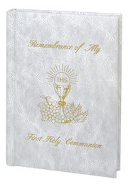 White book titled 'Remembrance of My First Holy Communion' on a white background