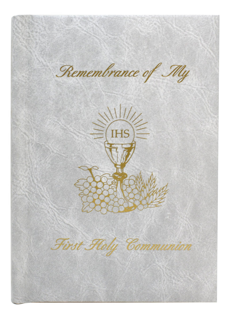 White book titled 'Remembrance of My First Holy Communion' on a white background